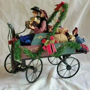 Traditions-Fabric Mache Family in Holiday Carriage